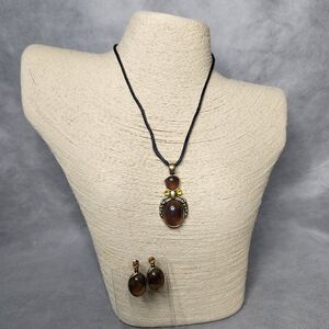 Paulus Elegant Pendant And Earring Set With Burnished Gold